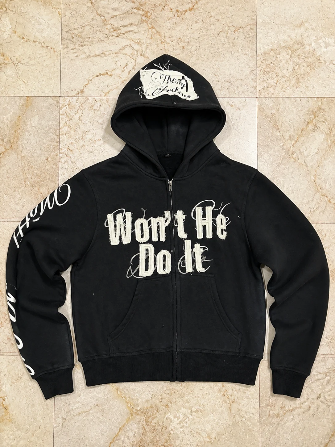 Custom black hoodie sample produced by Fabricly