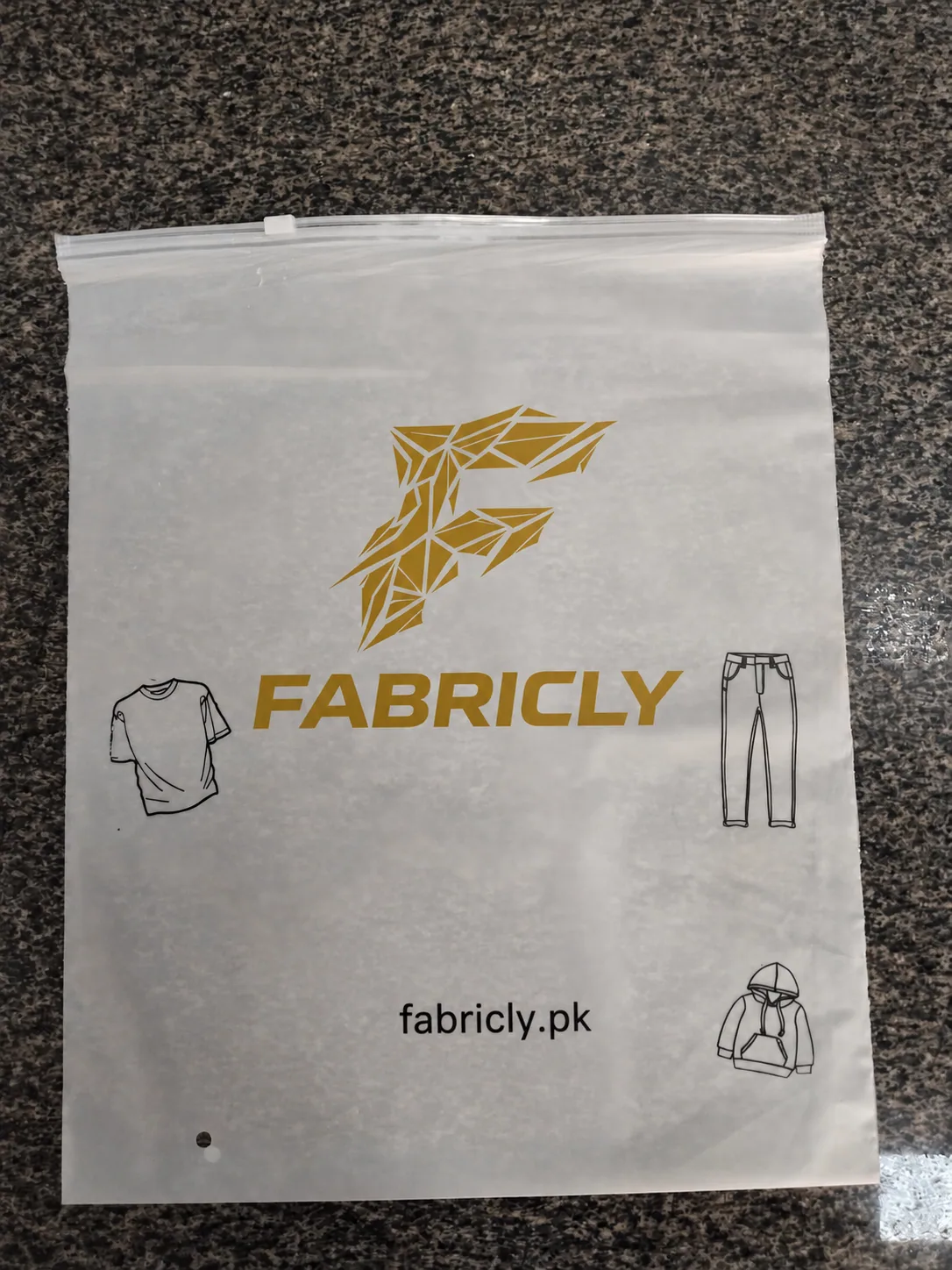Fabricly-branded custom garment packaging bag