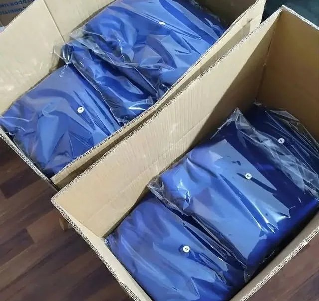 Packed garments arranged in shipping cartons