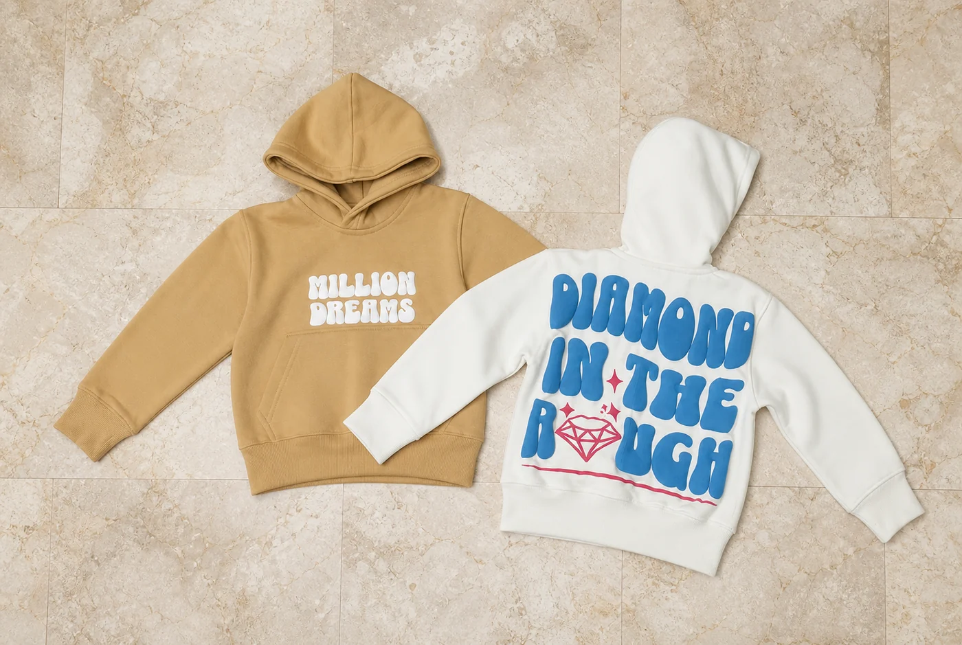 Tan and white custom graphic hoodies shown front and back
